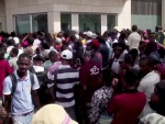 Haitiens devant l'ambassade américaine